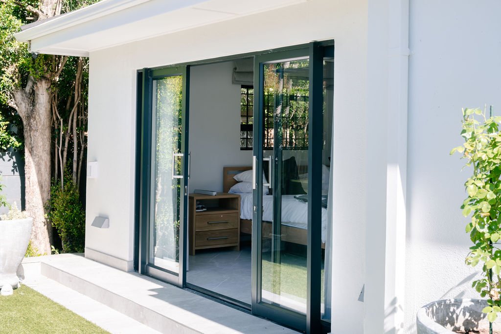 Aluminium glass doors onto patio